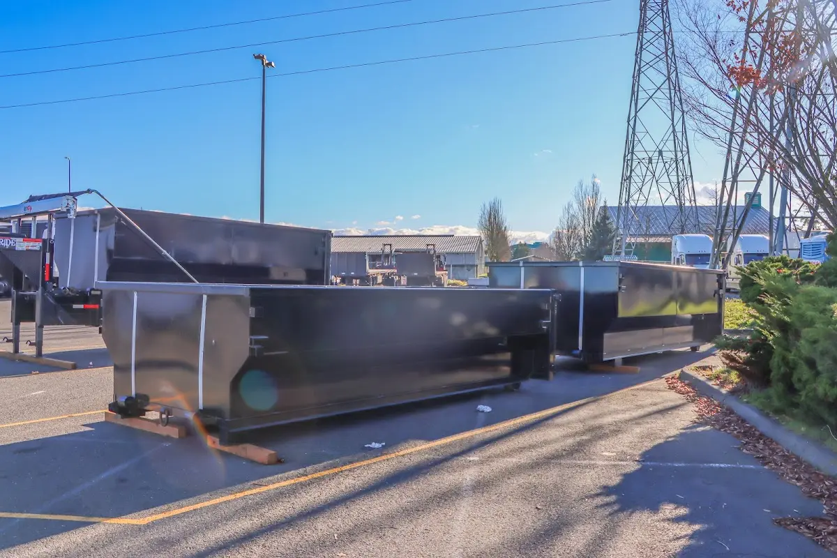 Roll-off dumpster ready for waste disposal at job site for 4 Yard Dumpster Rental in Fargo